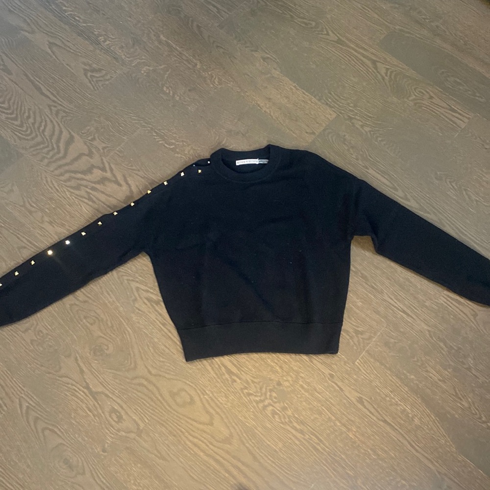 Alice + Olivia black sweater w/ gold pyramid studs down one shoulder,  size XS